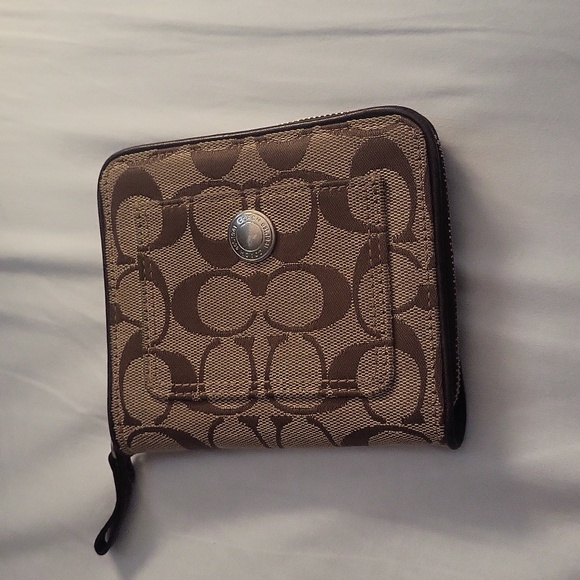 Coach Handbags - Vintage brown and tan coach zippered wallet